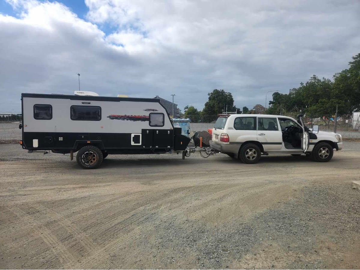 Caravan being towed by Patrol